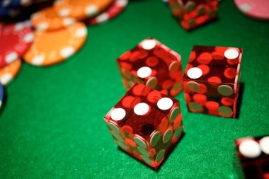 Live dealer at moyang Three Card Poker table dealing cards in professional studio